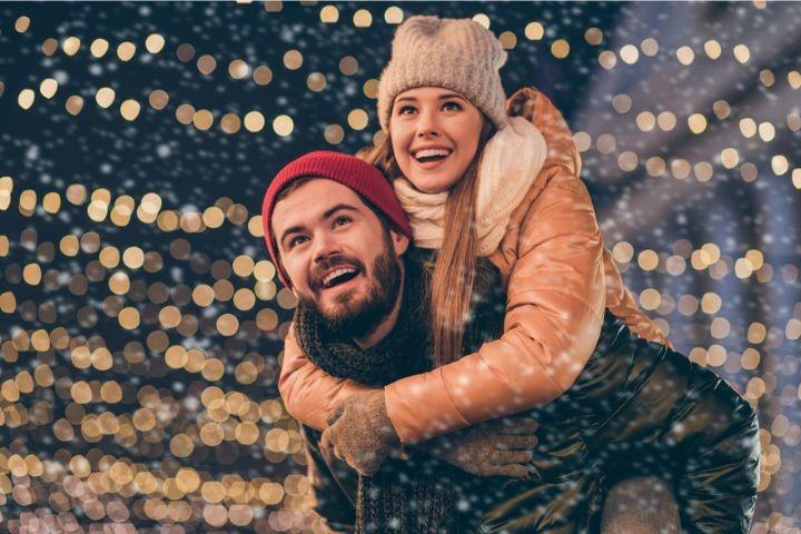 couple enjoying winter activities in the smoky mountains
