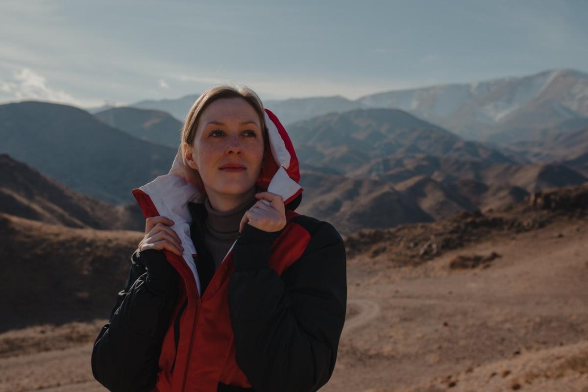 Woman who is dressed in layers while enjoying a hike in the Smokies.